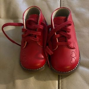 Never worn red walkers with stitch heart detail